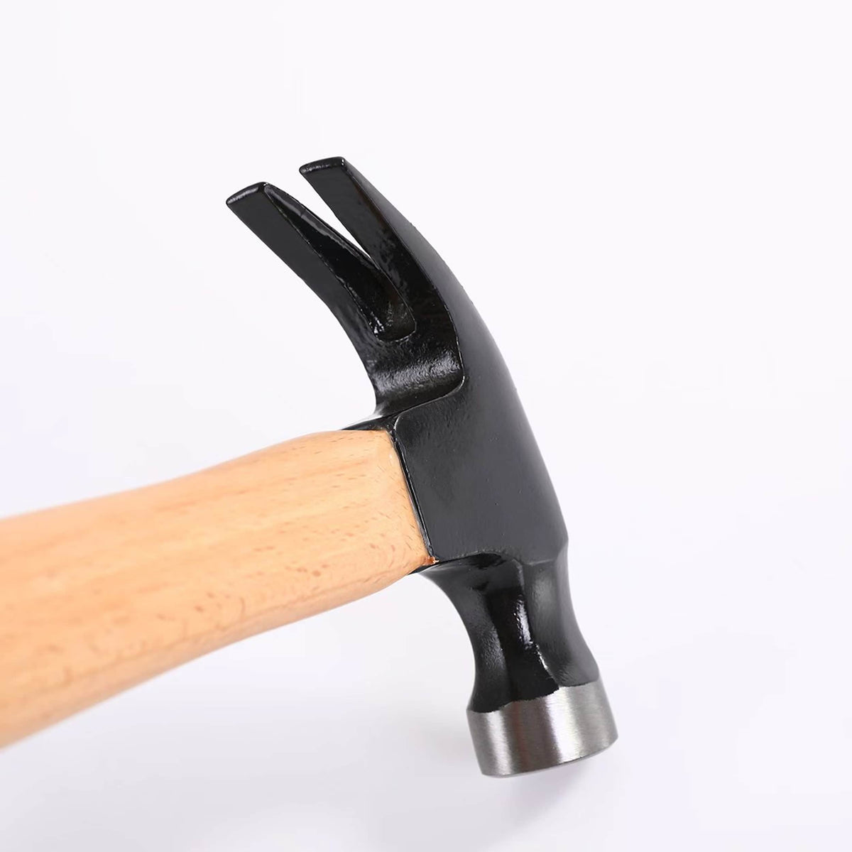 Magnetic 16 oz hammer head with wood handle, close-up