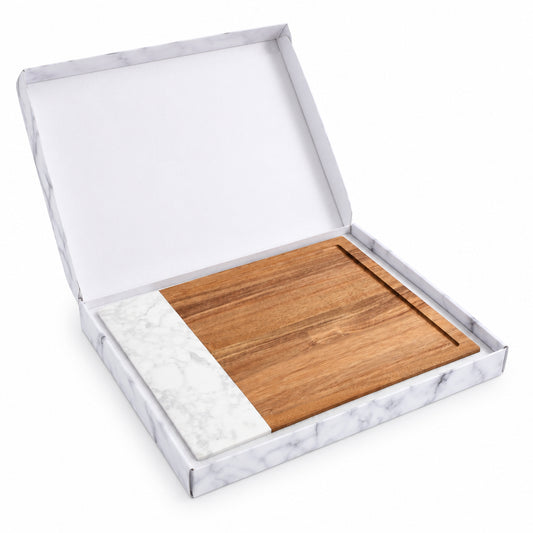 Marble and acacia cutting board juice groove detail
