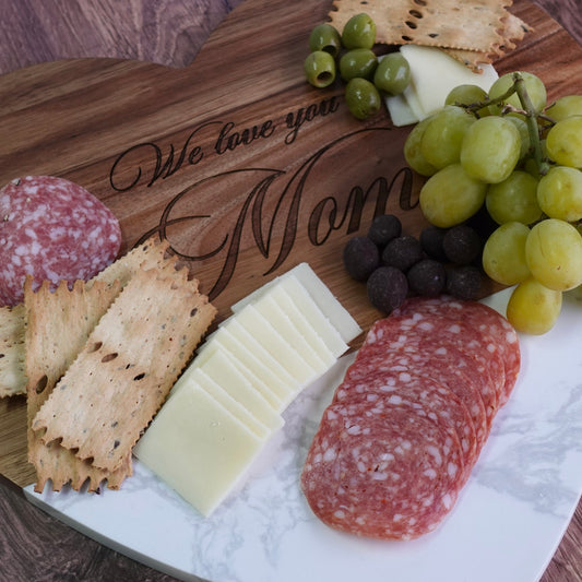 Personalized marble heart serving board engraved by Carve & Burn in Miami