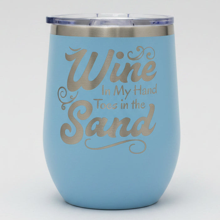 Blue tumbler with 'Wine in My Hand, Toes in the Sand'