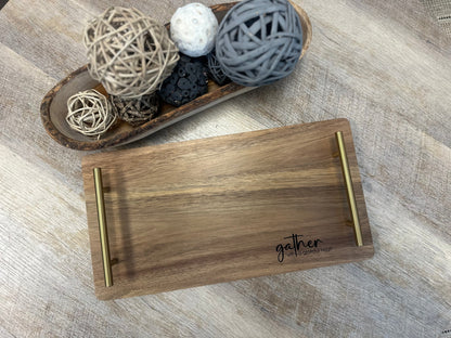 Personalized acacia serving tray with gold handles, engraved with a gather design