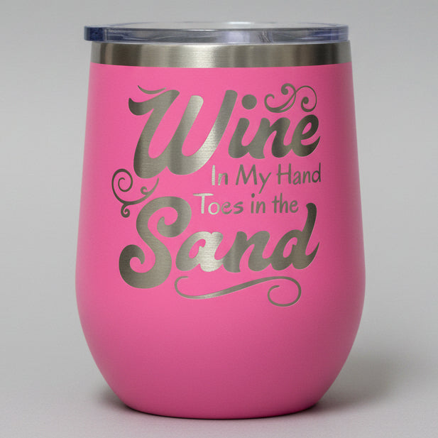 Pink tumbler with 'Wine in my hand, toes in the sand' 