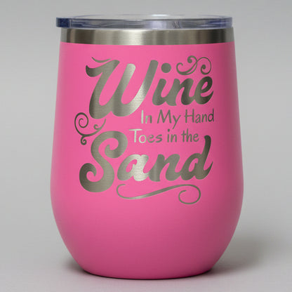 Pink tumbler with 'Wine in my hand, toes in the sand' 