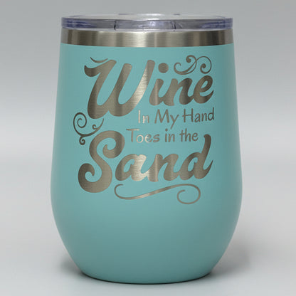 Teal tumbler with 'Wine in My Hand, Toes in the Sand' 