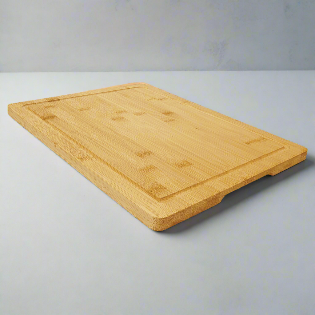 Bamboo cutting board with drip ring, 13.75 x 11 inch, angled view