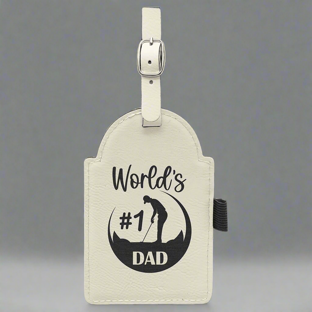 White leatherette golf bag tag engraved World's #1 Dad with a golfer graphic