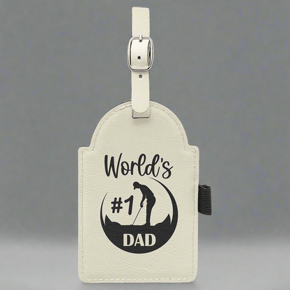 White leatherette golf bag tag engraved World's #1 Dad with a golfer graphic