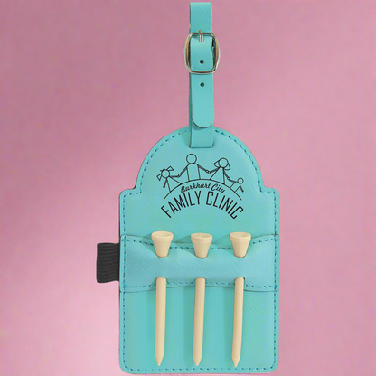 Teal leatherette golf bag tag with tees engraved with a golf tournament logo