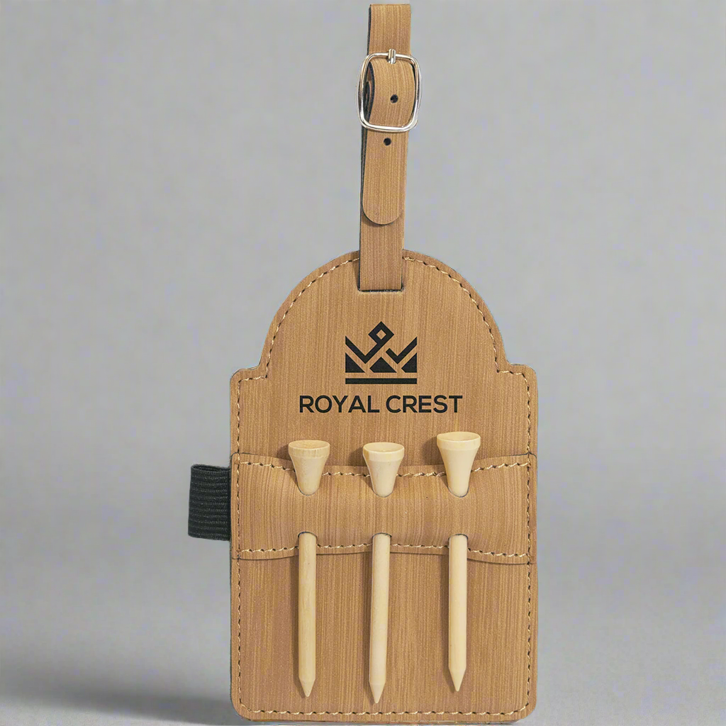 Light brown leatherette golf bag tag with tees engraved with a Royal Crest logo