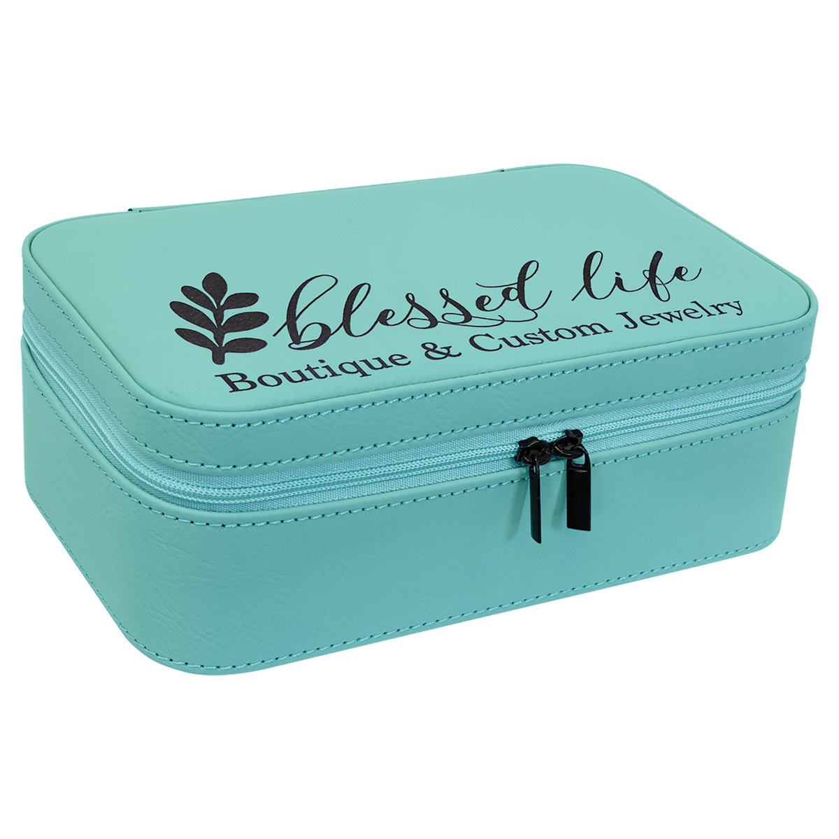 Teal leatherette travel jewelry box engraved with a Blessed Life boutique logo, angled view