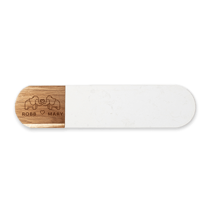 Oval white marble and acacia serving board engraved on the acacia end