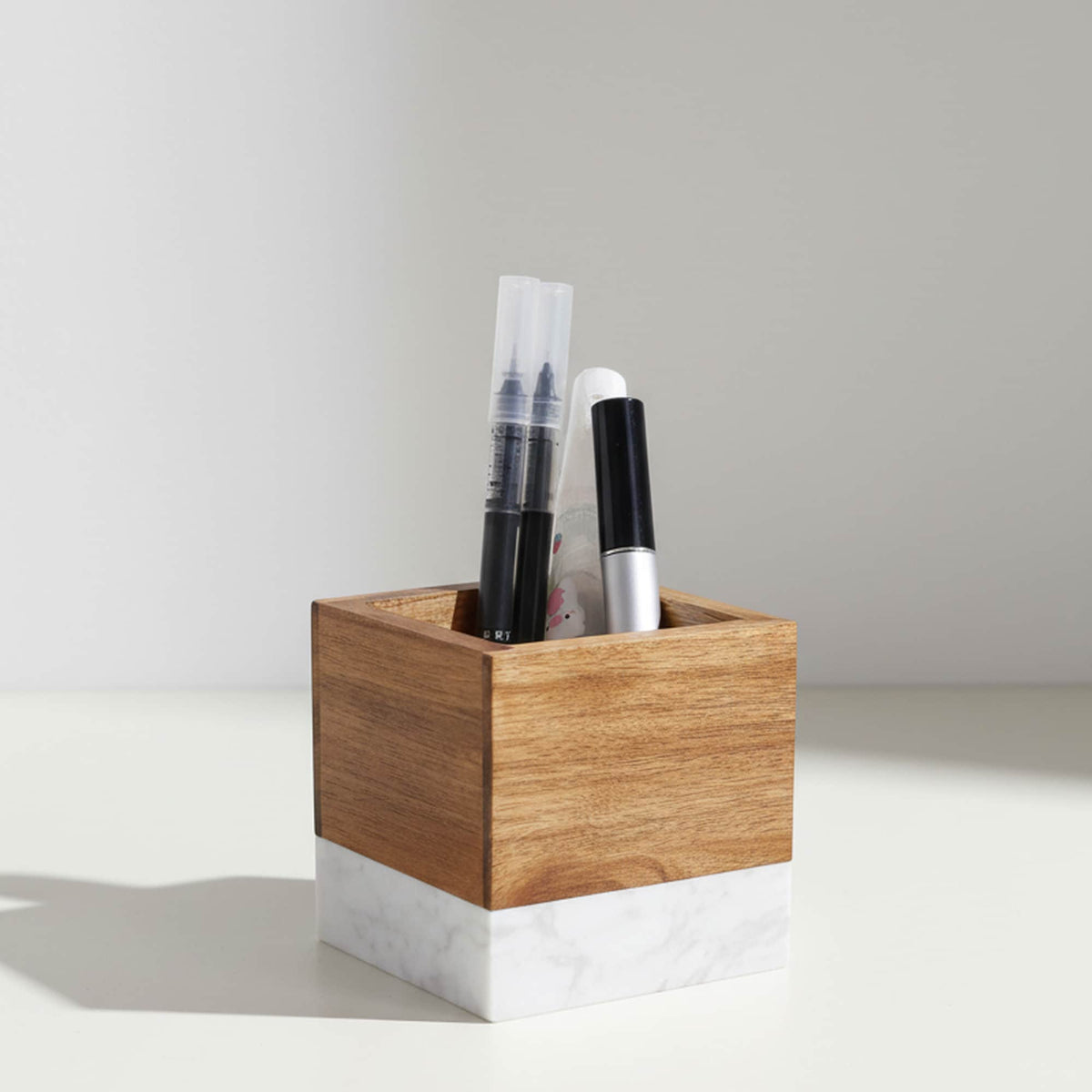 Marble and wood pen holder