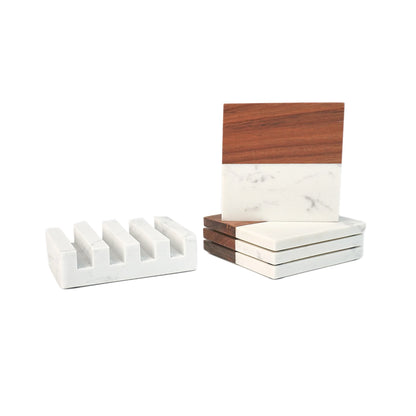 Marble and acacia coaster set shown beside its slotted marble base