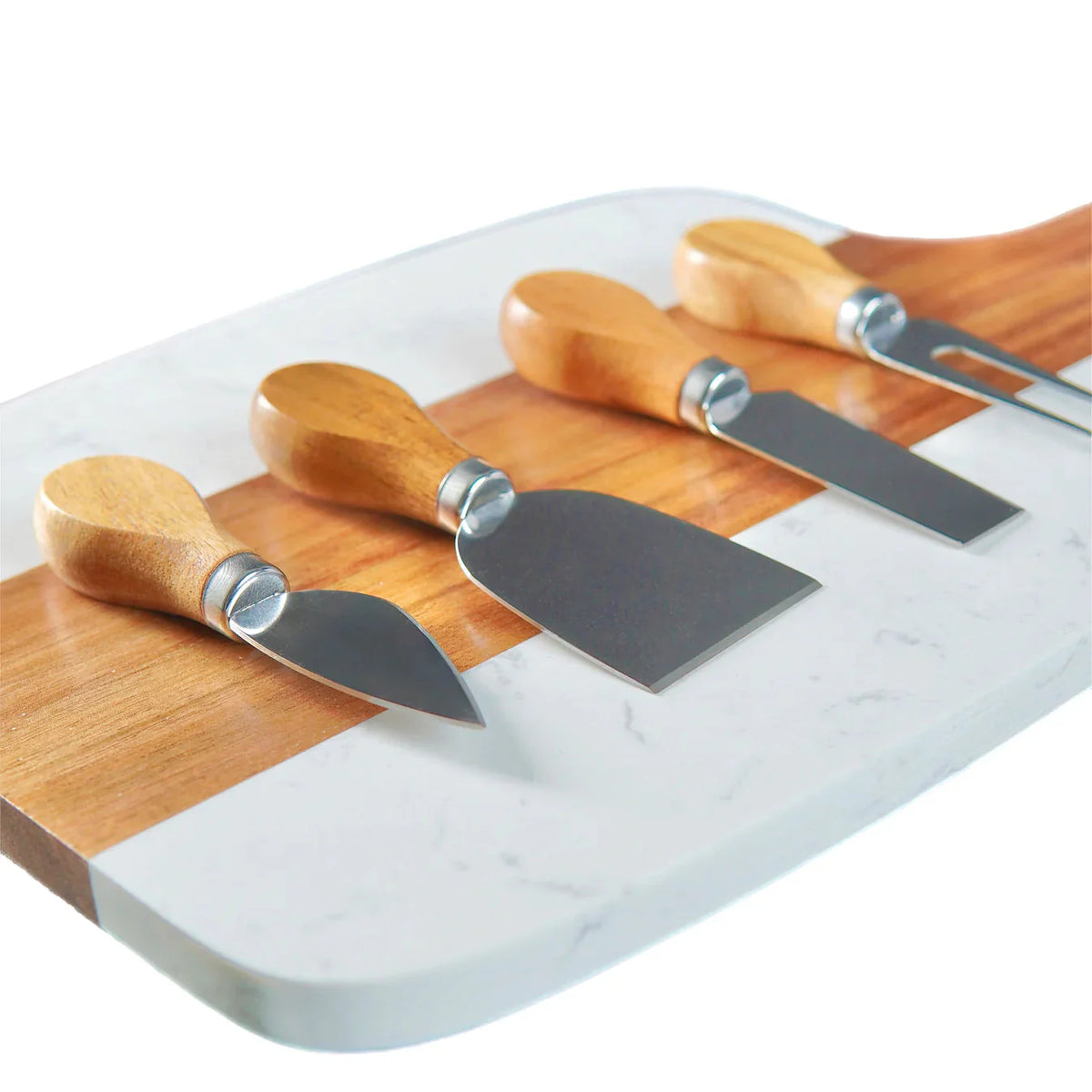 Marble and acacia serving board with cheese knives laid across it