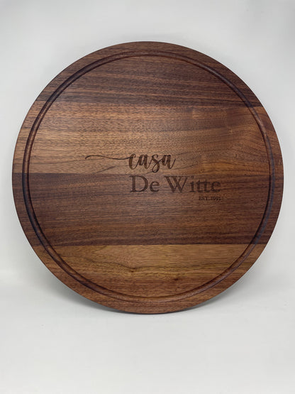 20 inch round black walnut serving board, laser engraved by Carve & Burn in Miami
