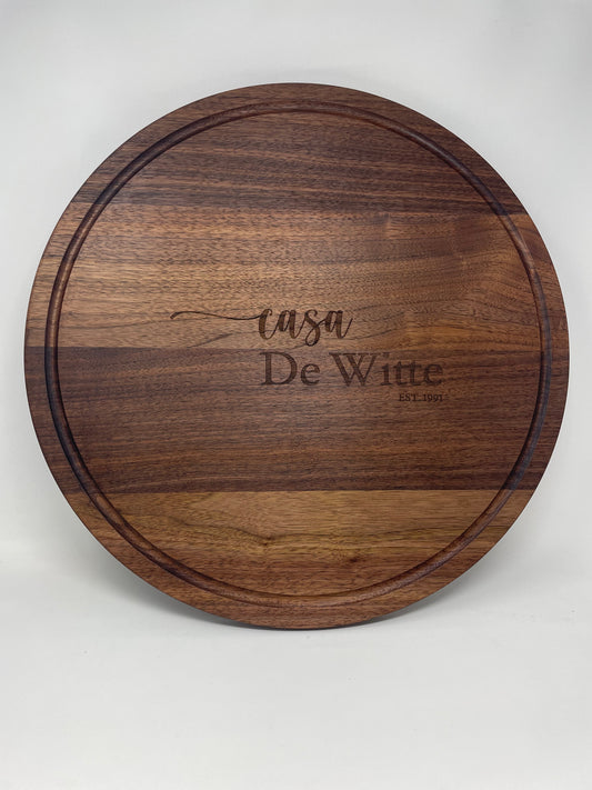20 inch round black walnut serving board, laser engraved by Carve & Burn in Miami