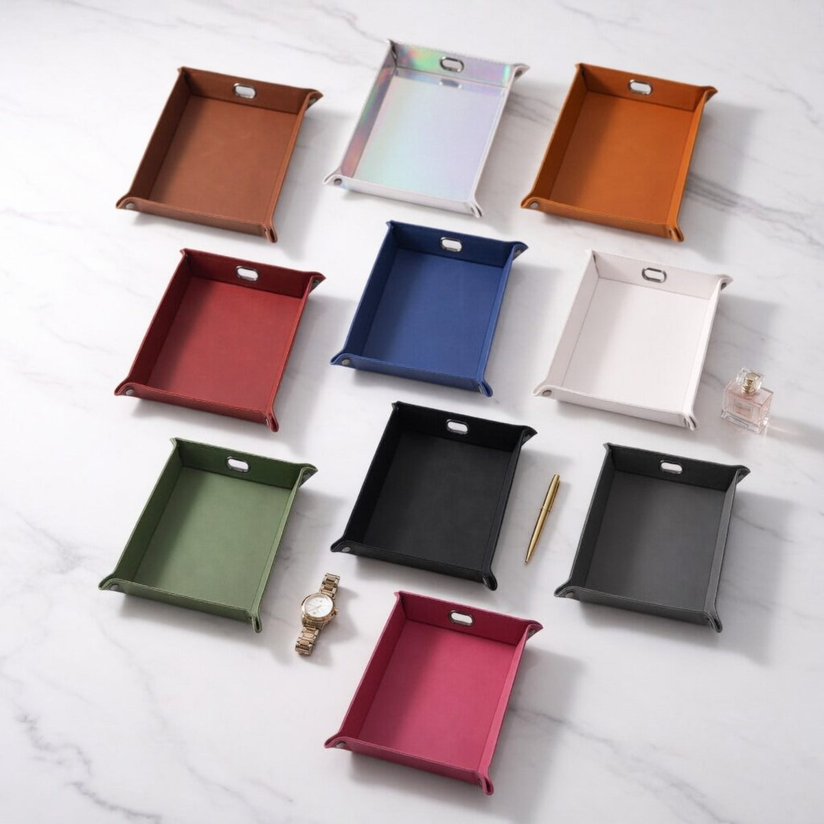 Personalized leatherette snap valet trays in ten colors, custom engraved by Carve & Burn in Miami