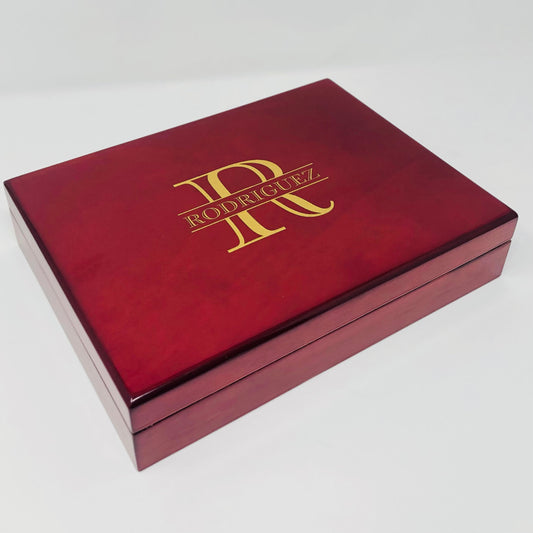 Rosewood piano finish cigar humidor engraved with a gold R Rodriguez monogram