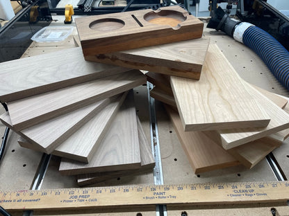 Batch of walnut cigar trays fresh off the CNC machine in our Miami shop