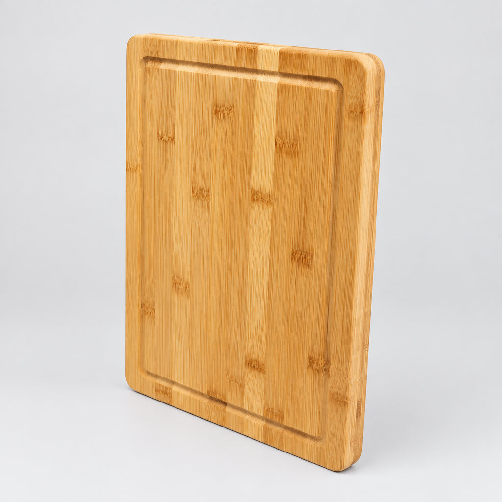 Bamboo cutting board with juice groove, 10 x 14 inch, angled view