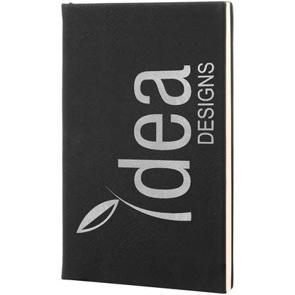 Black leatherette journal laser engraved with an Idea Designs business logo