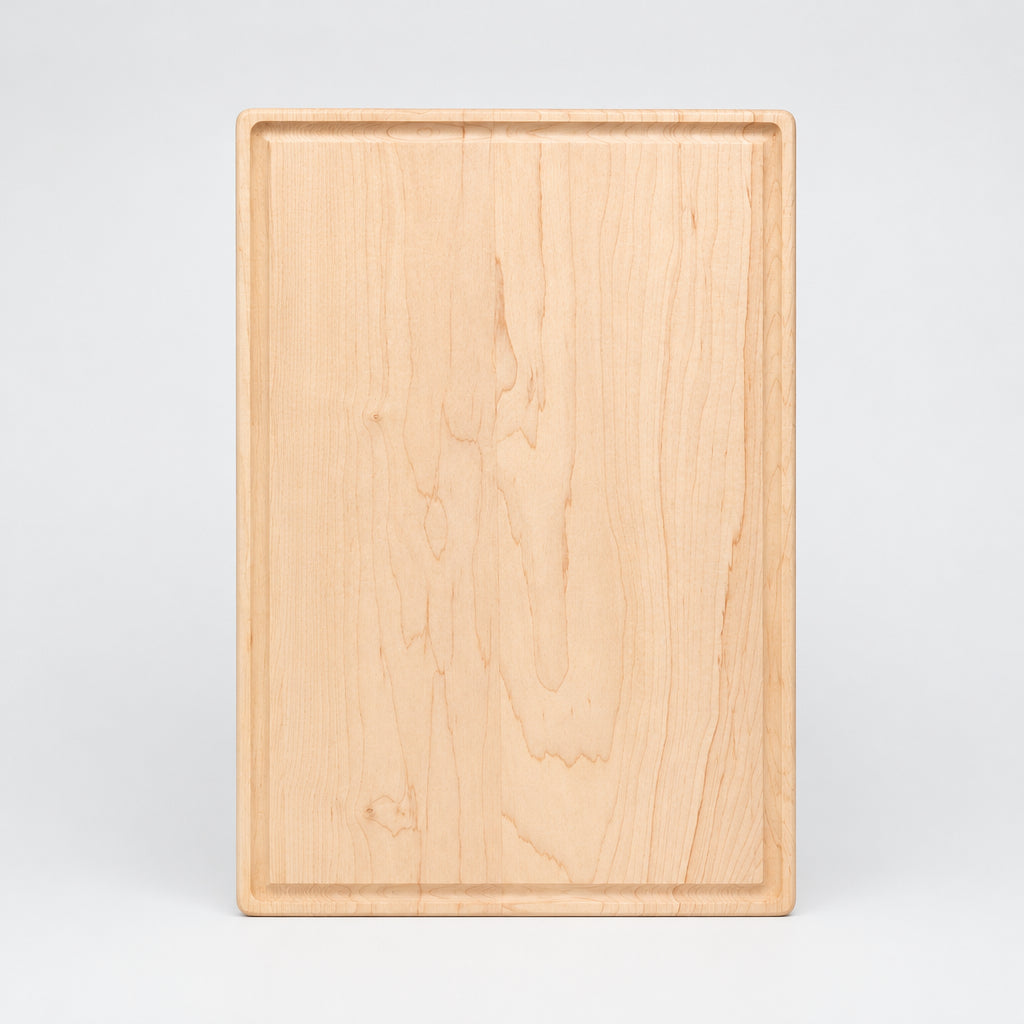 Maple 11 x 17 inch cutting board with juice groove, top view