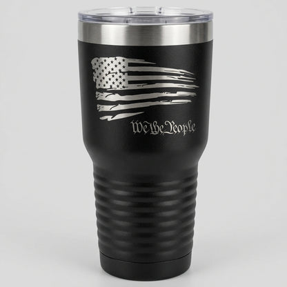A 30 oz black tumbler with a design of the American flag and the text 'We the People' on it.