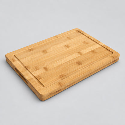 Solid bamboo cutting board with juice groove, laser engraved by Carve & Burn in Miami